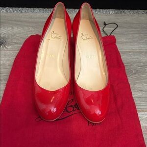 Christian Louboutin Red Patent Leather Round-Toe Pumps